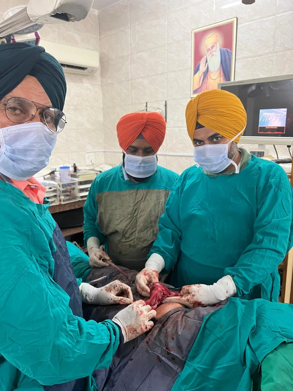 Dr Harjinder Singh Sidhu surgery room photo used in Amrit Hospital Moga review article
